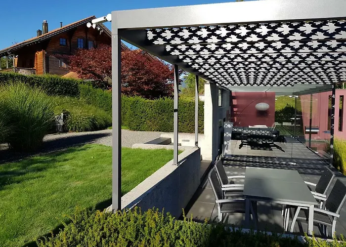 Carrera - Mit Traumgarten Appartement *